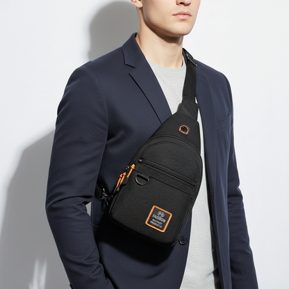 Praktická crossbody taška s několika kapsami na telefon, peněženku, powerbanku, karty, skládací deštník a tablet.